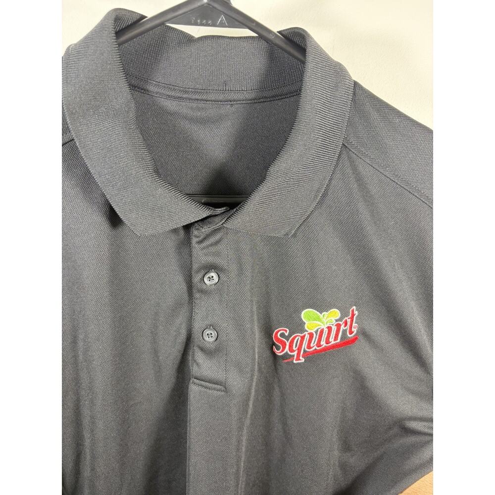 Men’s performance polo shirt featuring an embroidered Squirt Soda Logo Size L